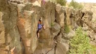View Of Rock Climber On Mountain With Gorgeous View By Aerial Drone Stock Footage