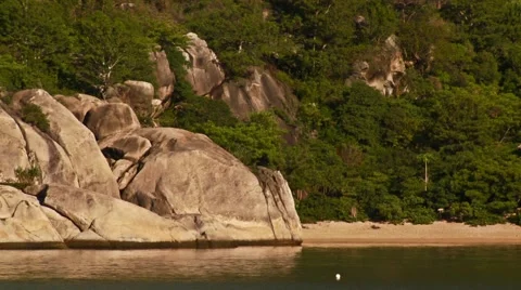 View of rock formation and mountain in Asian Island Stock Footage 54591507