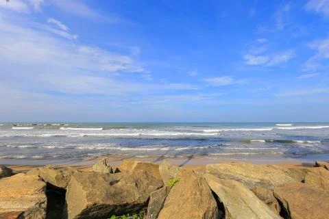 View of rocks on the ocean beach Photos