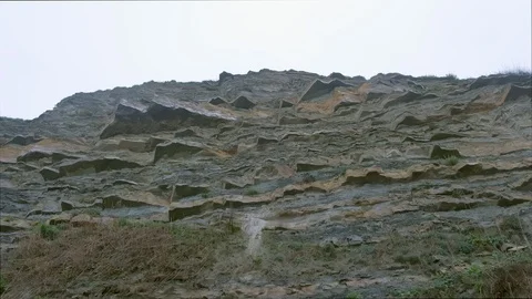 View on rocky mountain and sky in rainy day during overcast weather. Stock Footage 116366629