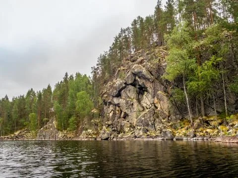 View of the  rocky steep cliffs of the Saimaa lake in the Kolovesi National P Stock Photos