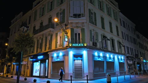 View of Rolex building at night in Cannes, French Riviera. Stock Footage 247217760