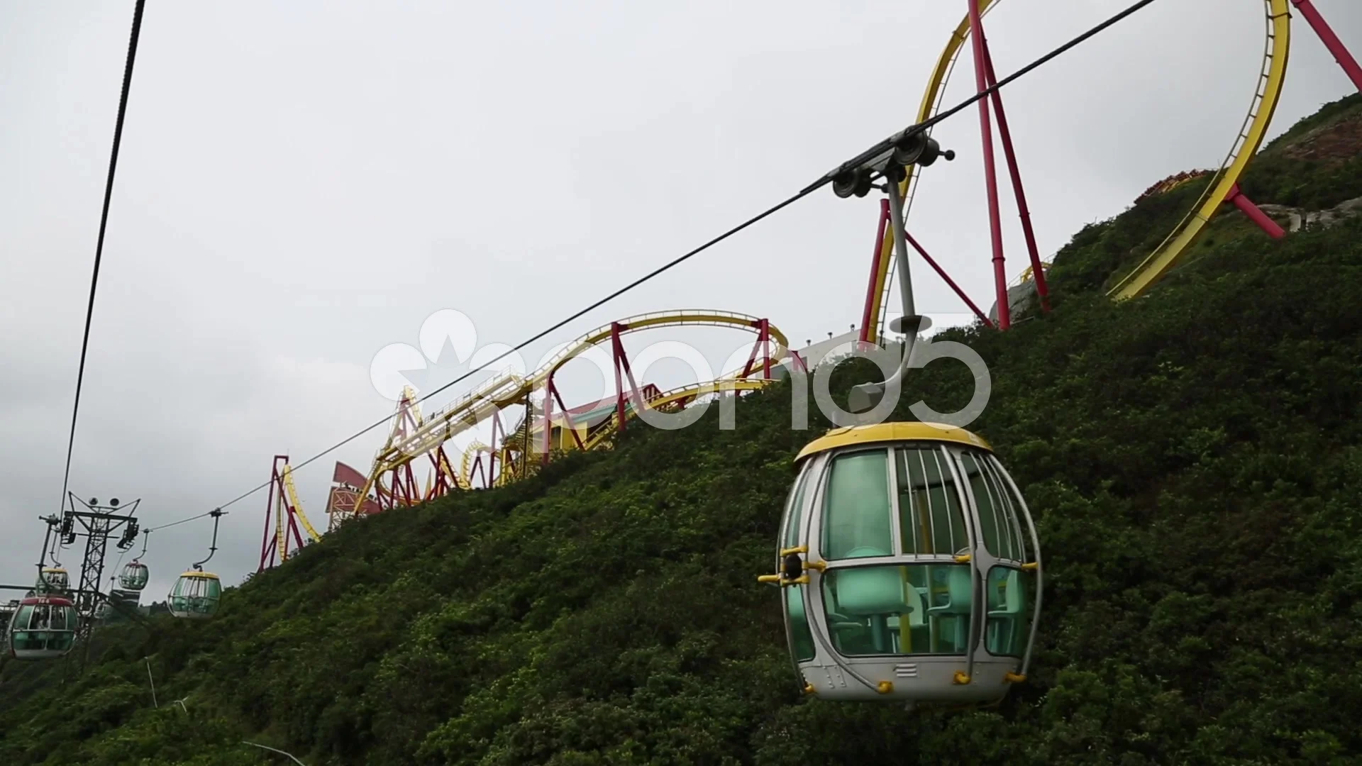 View of a roller coaster from the cabin cable car in the Ocean Park Hong Kong