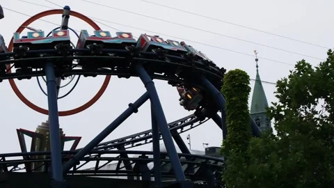 View of rollercoaster ride in Tivoli Gardens, Denmark. Stock Footage 343877570
