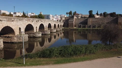 View of the Roman bridge of Mérida crossing the Guadiana river Stock Footage 297959977