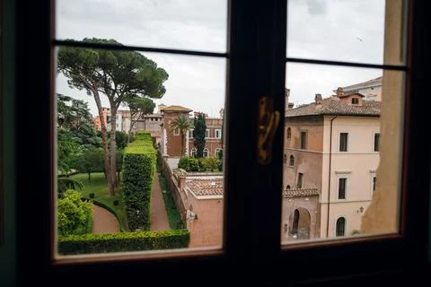 View of Roman Garden Through Window Stock Photos