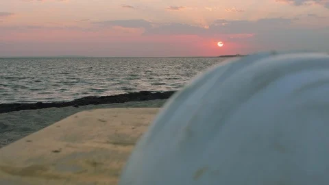 View of romantic sunset over sea. Shoot from moving training device for surfing Stock Footage 96160436
