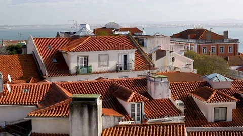 View on roofs and river Tejo, Lisbon, Portugal Stock Footage 123693792