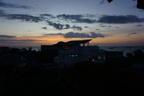 View from a rooftop onto the old town of Stone Town, Zanzibar at sunset Stock Photos