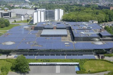 View on the rooftop solar panels and Trademart Building at Brussels Expo on.. Stock Photos