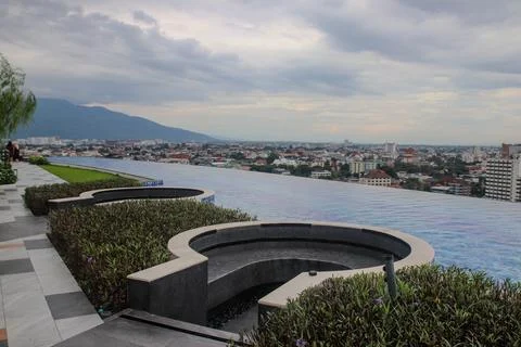 View from rooftop terrace with pool overlooking Chiang Mai city Stock-Fotos