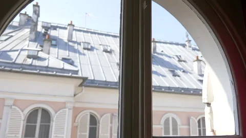 View of rooftops and chimneys out a window in Paris, France, Europe. Stock Footage 199152577