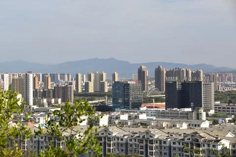 View of the rooftops and high rise buildings of Luoyang in Henan Province, .. 写真素材