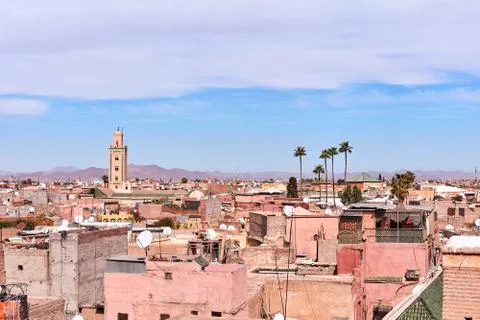 View of the rooftops of Marrakech and the mountains of Atlas in the distance Stock Photos