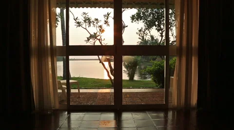 View from the room window on the lake and sunset Stock Footage 49904901