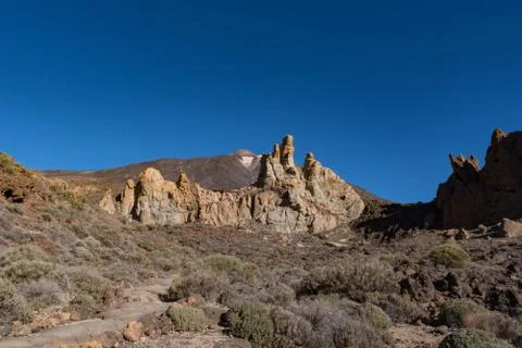 View of Roques de Garca unique rock formation with famous Pico del Teide moun Stock Photos