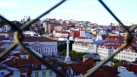 View of Rossio square from Santa Justa elevator's steel bridge in Lisbon, Portug Stock Footage 239945084
