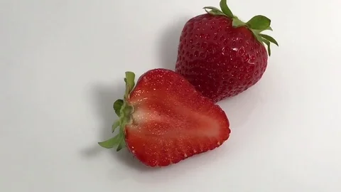 View of the rotation of the object: A lot Red strawberry, berry fruit, sweet Stock Footage 80743203