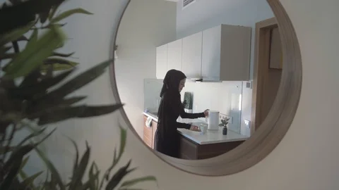 View from a round mirror an elegant young Arab woman in traditional dress Video stock 113749475