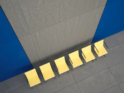 View to row of six yellow chairs in a lobby from above, 3D Rendering Illustrazione stock