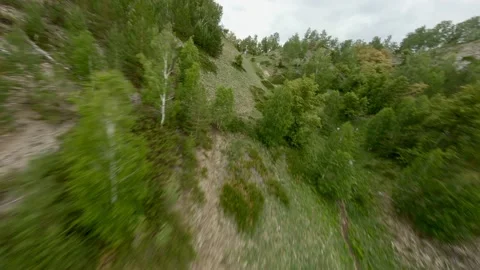 View of the rugged forests that cover the mountainside. Rock and rock Stock Footage 156462491