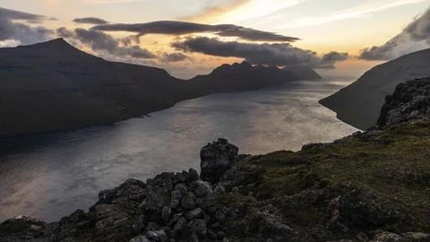 View of the rugged mountain landscape of Kalsoy from the summit of Mount Klakkur Stock Photos