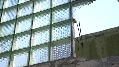 View of run down abandoned building with broken window. Stock Footage 80979063