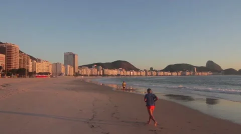 View of runners on the beach - Rio de Janeiro Stock-Footage 53774546