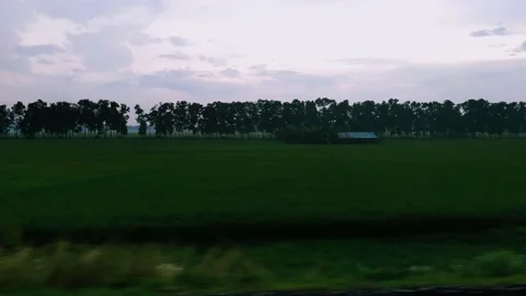 View from running train's window at evening Stock Footage 164660183