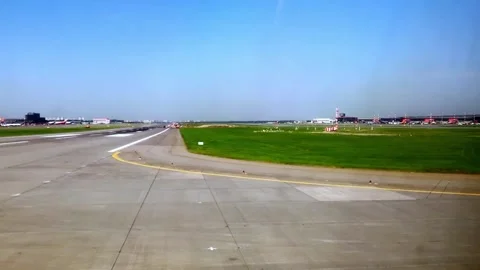 View of the runway from the airplane window. The plane is accelerating for Stock Footage 159591481