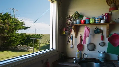 View from a rural kitchen in Australia with wind tower in close proximity Stock Footage 87848869