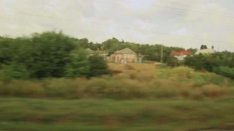 View of the Russian suburb from the train window Stock Footage 158012261