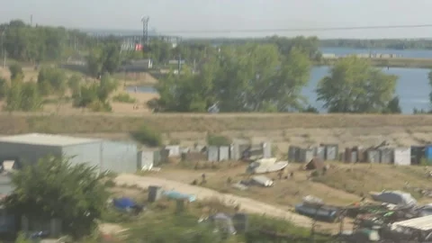 View of the Russian suburb from the train window Stock Footage 158012297