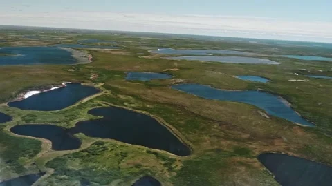 View of Russian tundra its rivers lakes ground from helicopter widow. Stock Footage 165437200