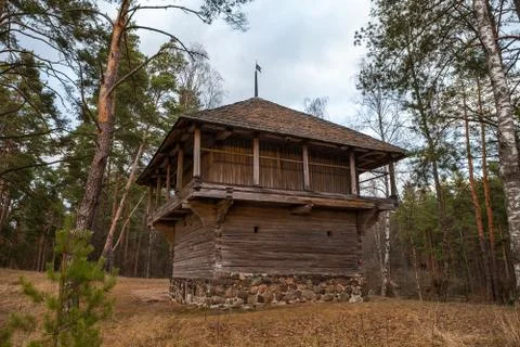 View of the rustic farm two-storey barn. Wooden architecture of North and Stock Photos