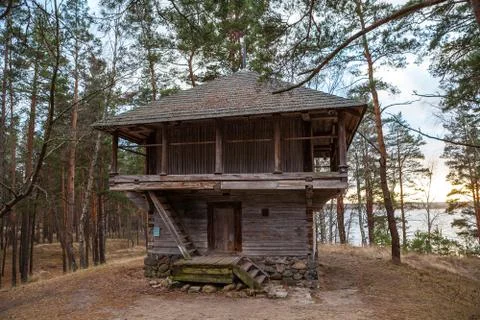 View of the rustic farm two-storey barn. Wooden architecture of North and Stock Photos