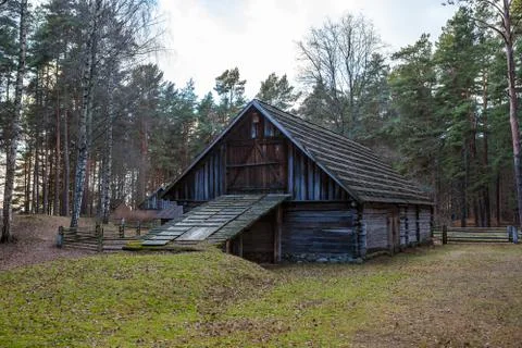View of the rustic farm two-storey barn. Wooden architecture of North and Stock Photos