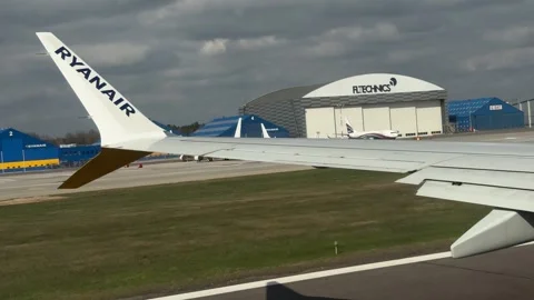 View from Ryanair aircraft window while taking off at Kaunas Airport Stock Footage 308241520