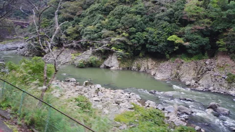 View from Sagano Sight-Seeing Tramトロッコ嵯峨駅, Kyoto, Japan Stock Footage 291759121