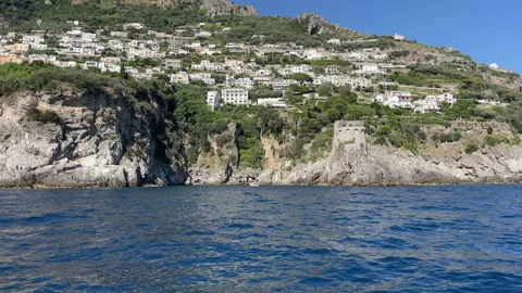 View from sailing motor bot on breathtaking Amalfi coast in a sunny day Video stock 316835588