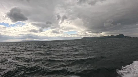 View sailing open ocean waters with choppy waves under cloudy sky in Norway Stock-Footage 342755857