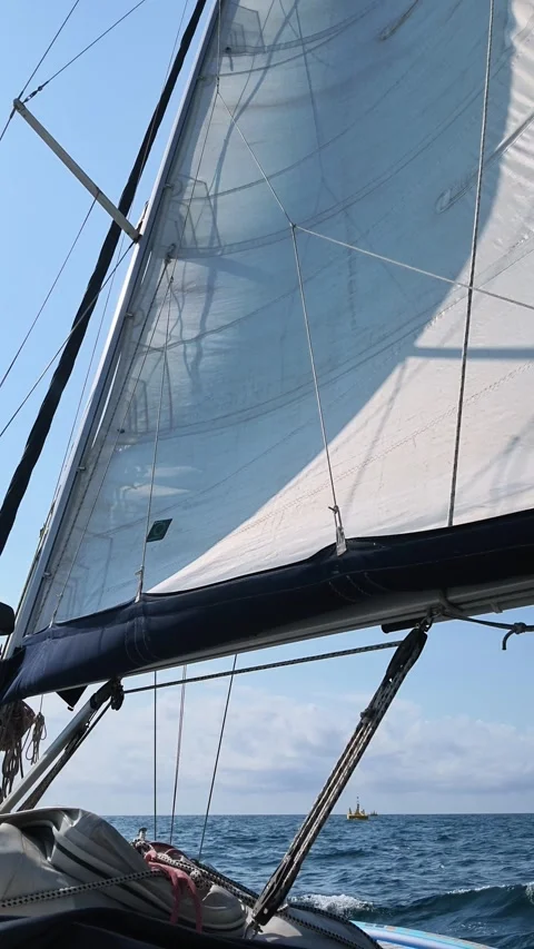 View from sailing yacht deck during offshore voyage on sunny day Video stock 344693087