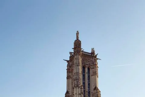 View of Saint-Jacques Tower with clear / blue sky background in Paris. Stock Photos