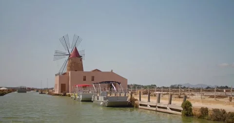 View of Saline Ettore e Infersa, salt processing facility on Sicily, Italy, 4k Stock Footage 332717076