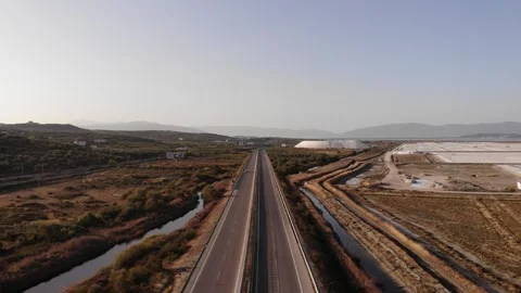 View of a salt flat factory besides the sea in Albania - Drone Shot of salt Stock Footage 255563232