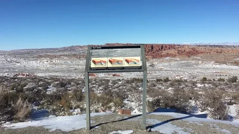 View Of Salt Valley With Info Sign At Arches National Park IMG 0180 Stock Footage 80573683