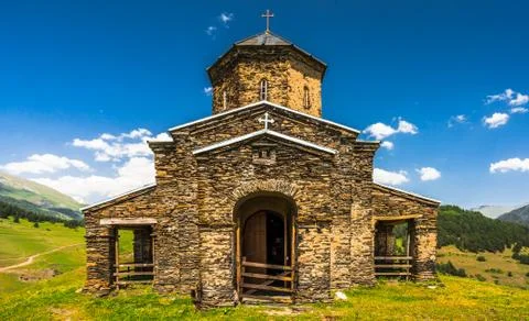 View on The Sameba Church of the Holy Trinity in the remote Tusheti village of Stock Photos