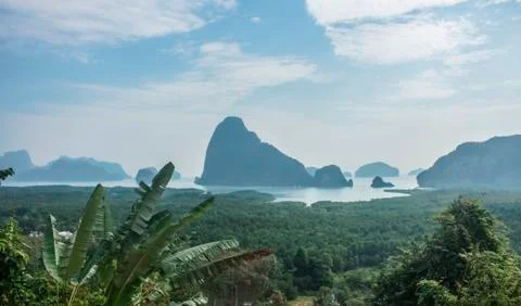 View from Samet Nangshe viewpoint to Phang-nga bay limestone mountains. Banana Stock Photos