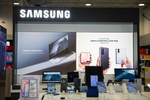 View of Samsung electronics display in retail store. Toronto, Canada - August 5, Stock Photos