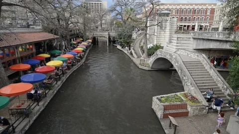 View of the San Antonio River Walk with restaurants and people, Texas, USA Stock Footage 88957453